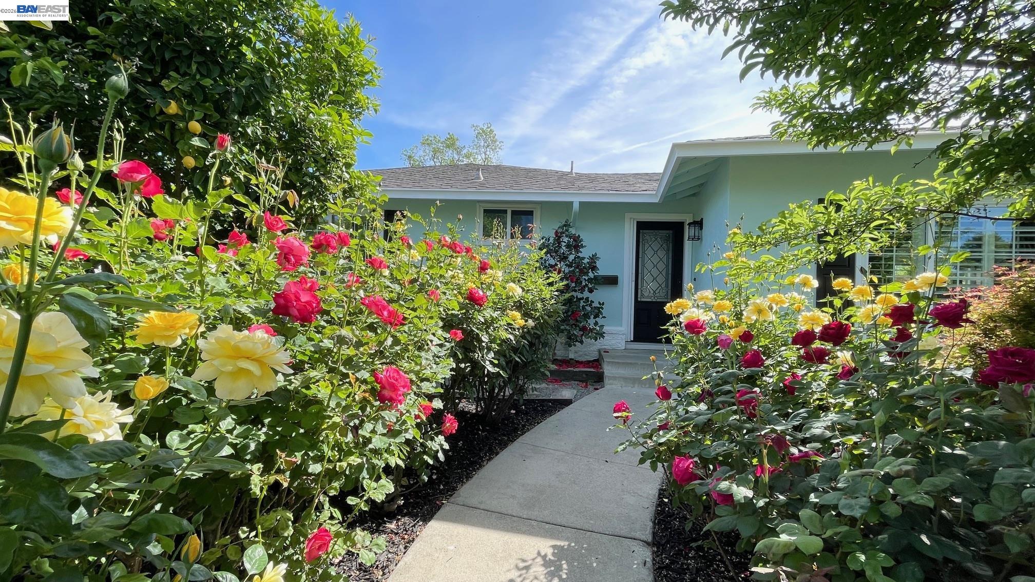 4022 Silver Street Pleasanton, CA 94566 - Photo 1 of 1 a bunch of flowers are in front of house