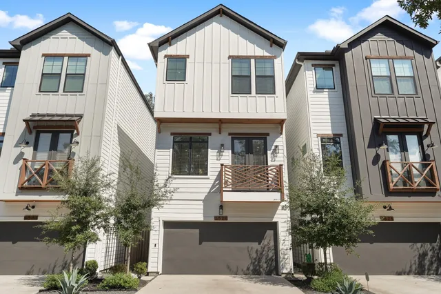 a front view of a house with a porch