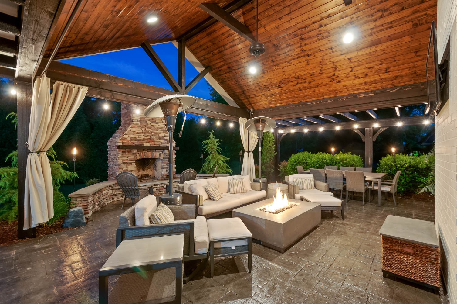 5939 Post Road Nashville, TN 37205 - Photo 2 of 49 a outdoor space with patio the couches and a dining table with the view of garden