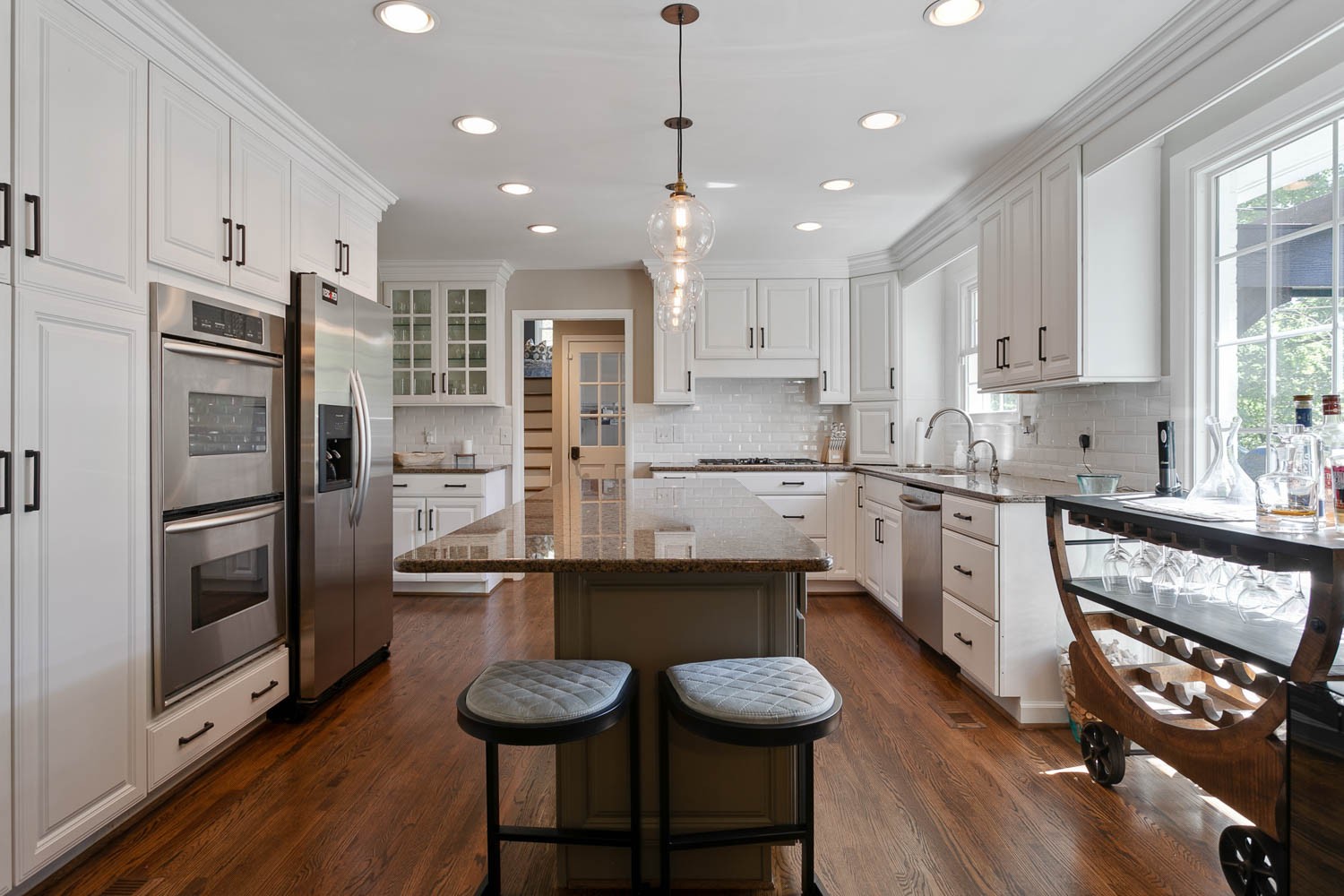 5939 Post Road Nashville, TN 37205 - Photo 17 of 49 a kitchen with stainless steel appliances granite countertop a sink refrigerator and cabinets