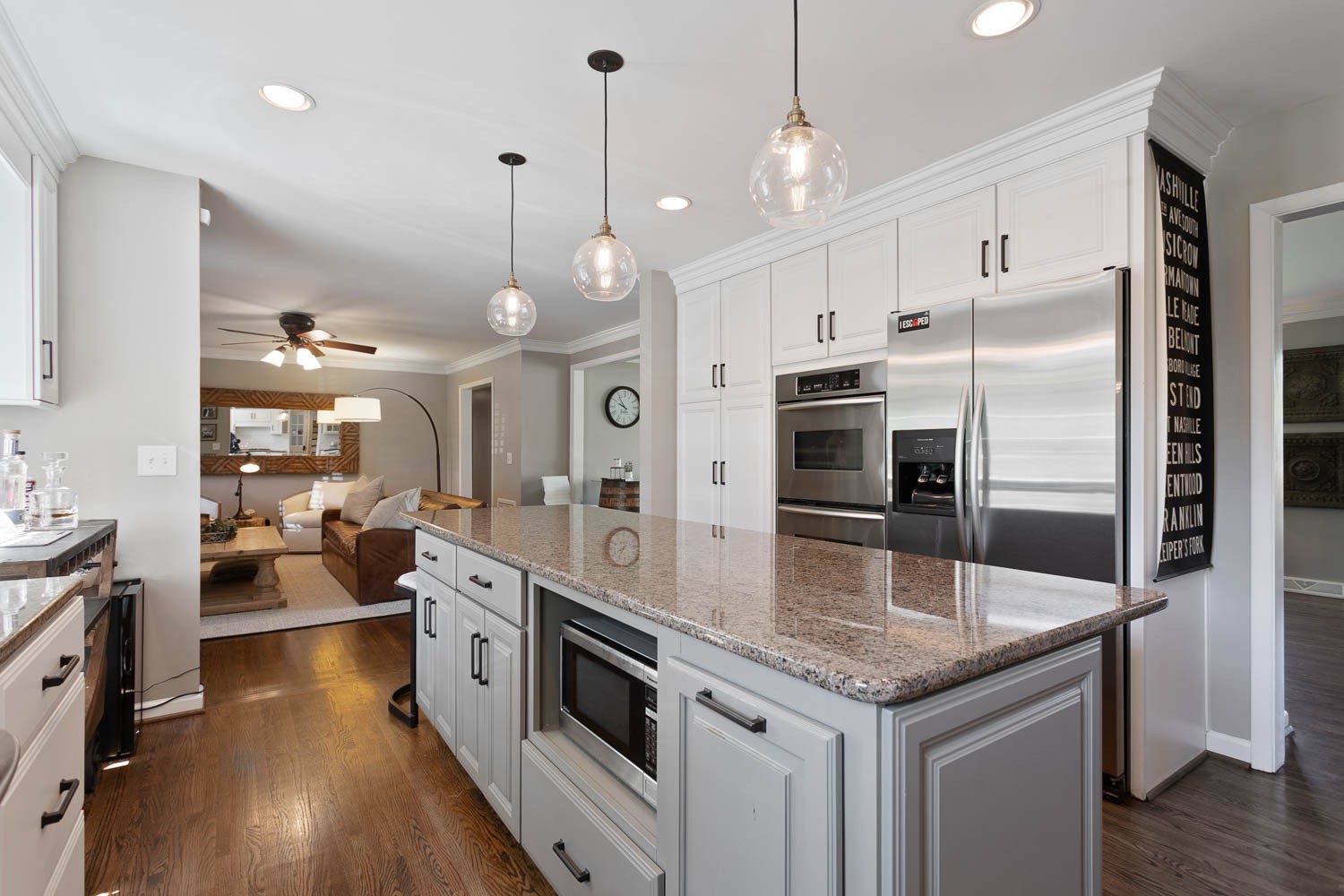 5939 Post Road Nashville, TN 37205 - Photo 20 of 49 a kitchen with stainless steel appliances granite countertop a stove oven and a refrigerator