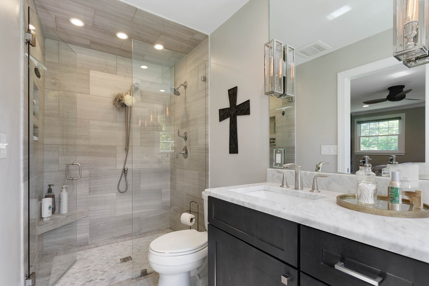 5939 Post Road Nashville, TN 37205 - Photo 26 of 49 a bathroom with a granite countertop sink a toilet a mirror and shower