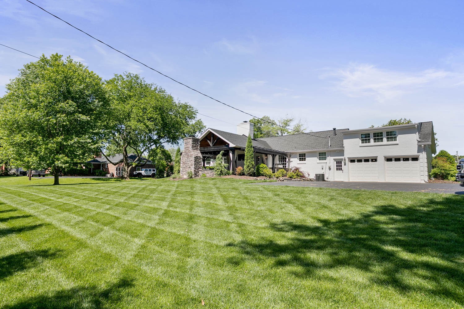 5939 Post Road Nashville, TN 37205 - Photo 41 of 49 a front view of a house with a yard