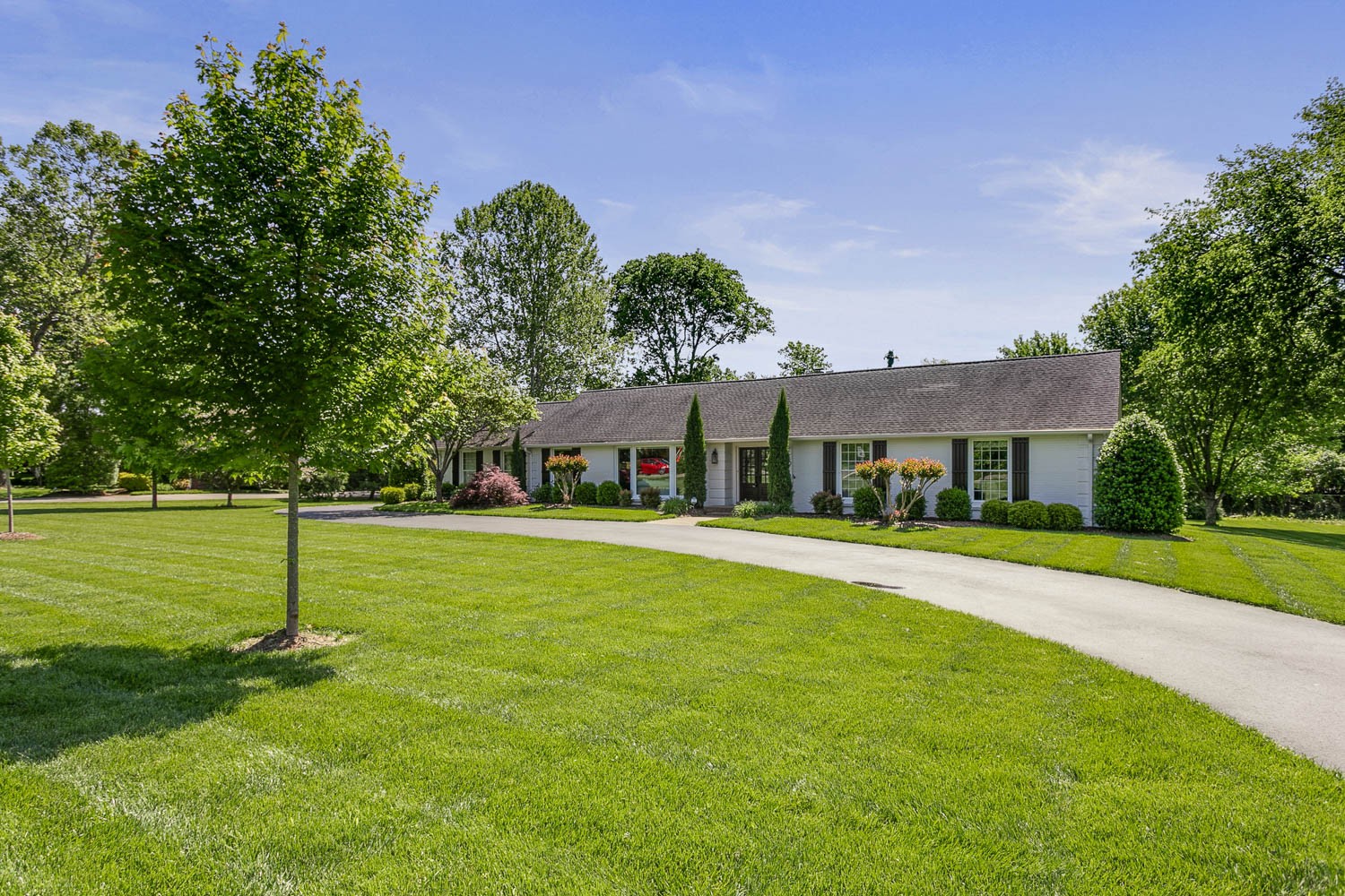 5939 Post Road Nashville, TN 37205 - Photo 7 of 49 a front view of a house with a yard
