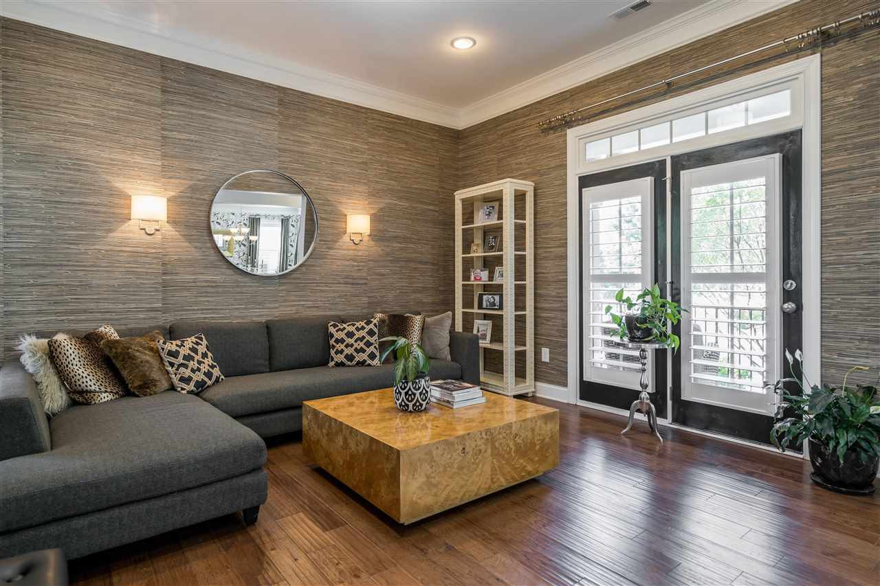 1400 Van Page Boulevard Raleigh, NC 27607 - Photo 5 of 30 Living room with recessed lighting, sconces, 10' ceilings, outdoor access, hardwoods and shutters! Living Room