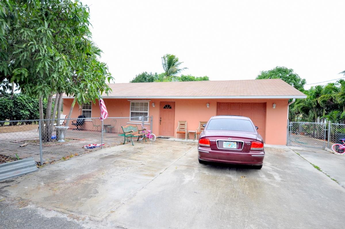 2386 East Dolphin Ridge Road West Palm Beach, FL 33406 - Photo 1 of 17 Front Exterior 2
