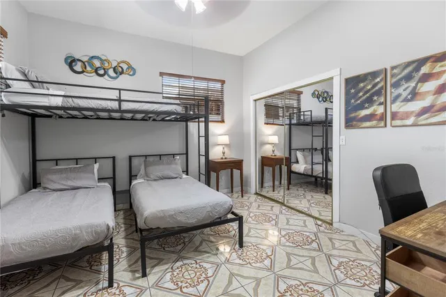 a spacious bathroom with a sink mirror and a bath tub