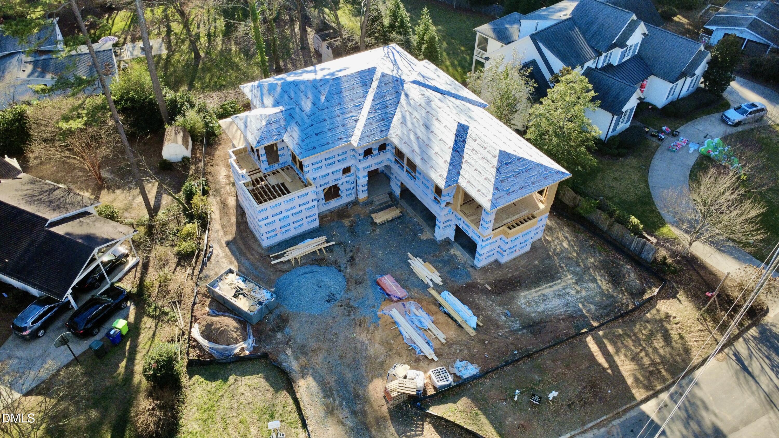 4907 Yadkin Drive Raleigh, NC 27609 - Photo 3 of 9 an aerial view of a house with a garden