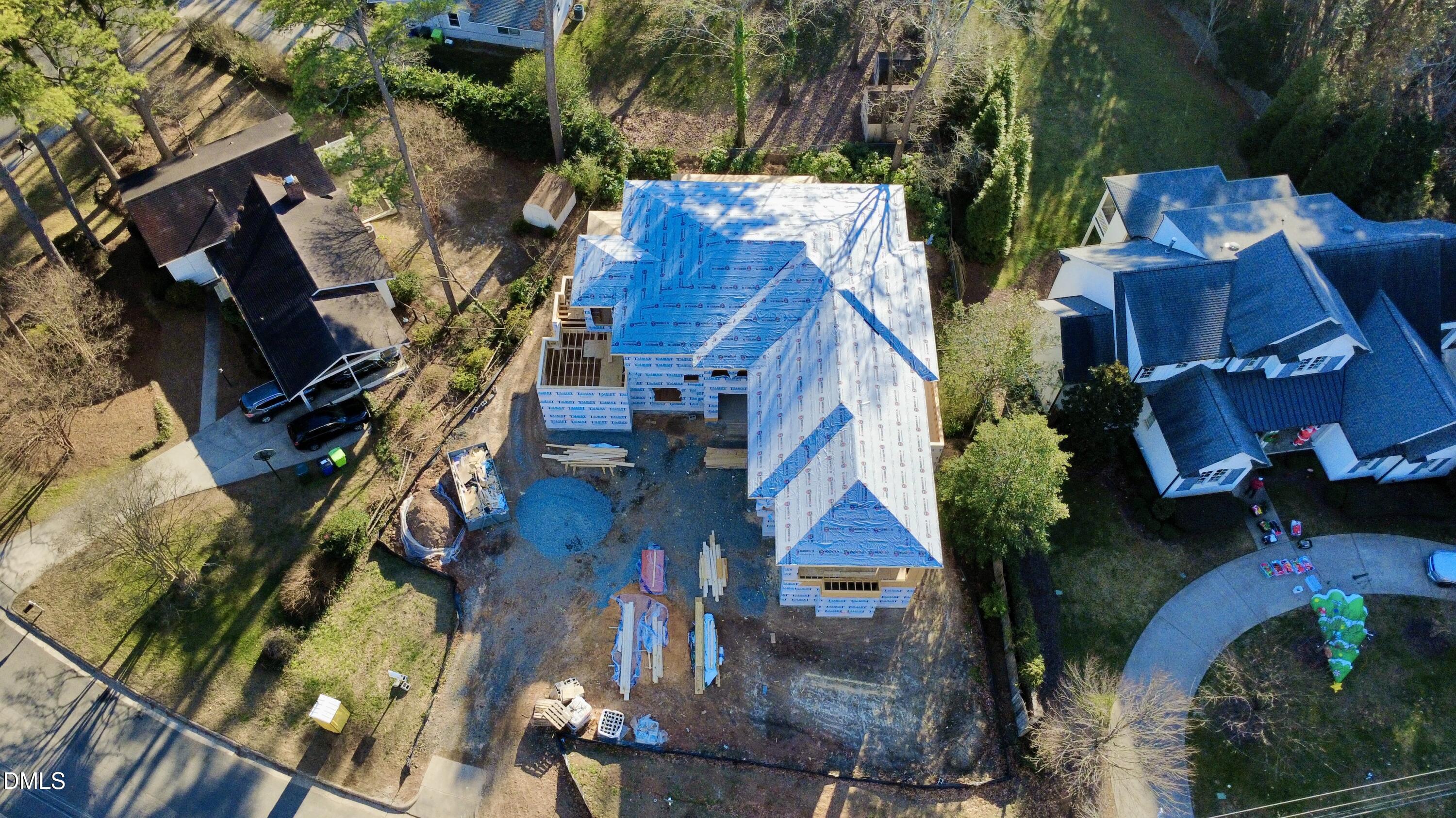 4907 Yadkin Drive Raleigh, NC 27609 - Photo 8 of 9 an aerial view of houses with outdoor space
