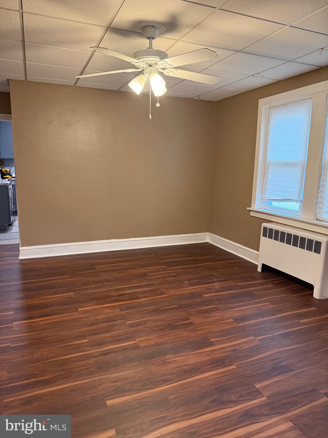 1482 Glassboro Road, Unit A Wenonah, NJ 08090 - Photo 8 of 12 a view of a room with wooden floor and white walls