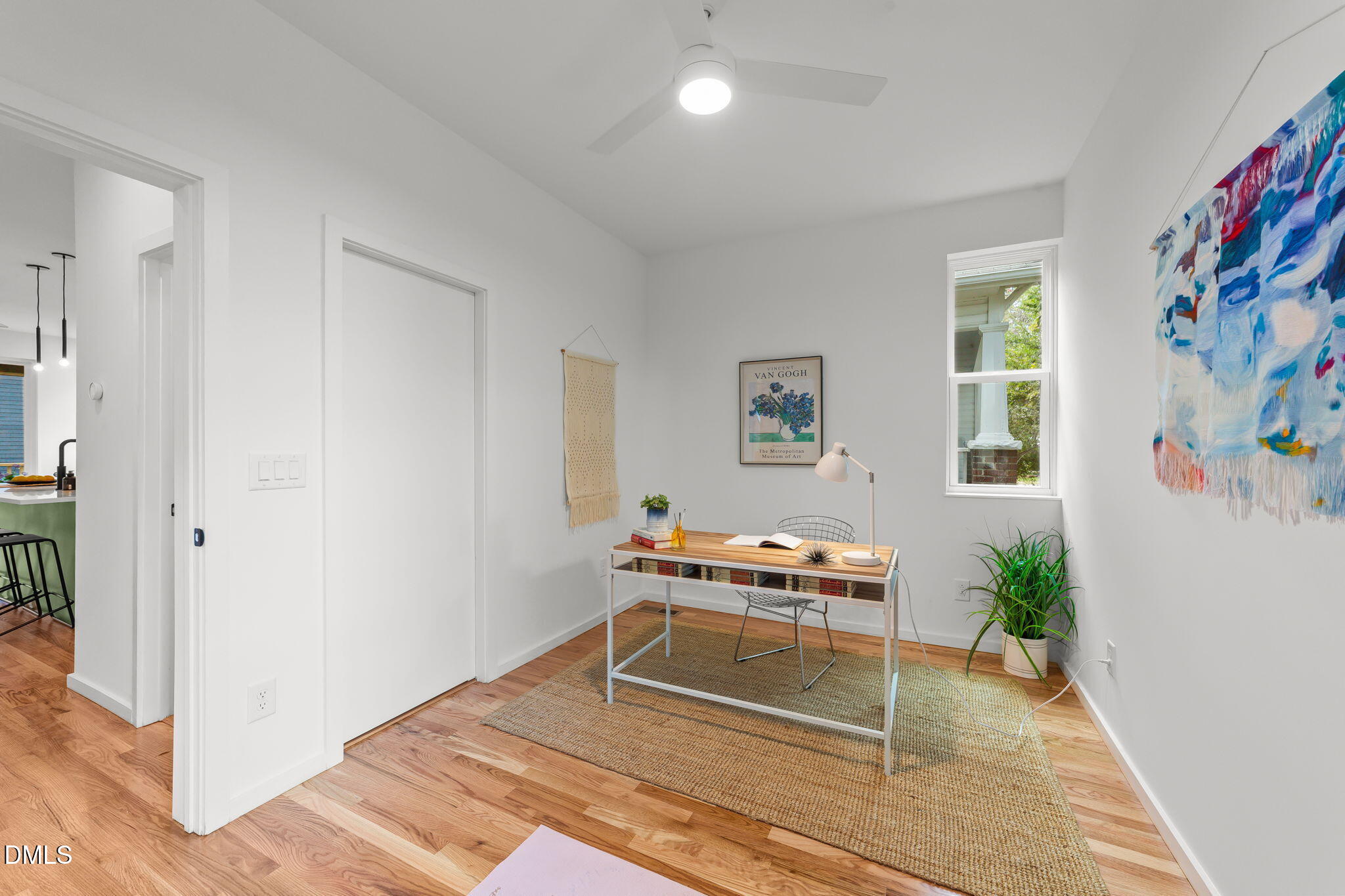 301 Clark Street Durham, NC 27701 - Photo 14 of 30 a room with furniture and a potted plant