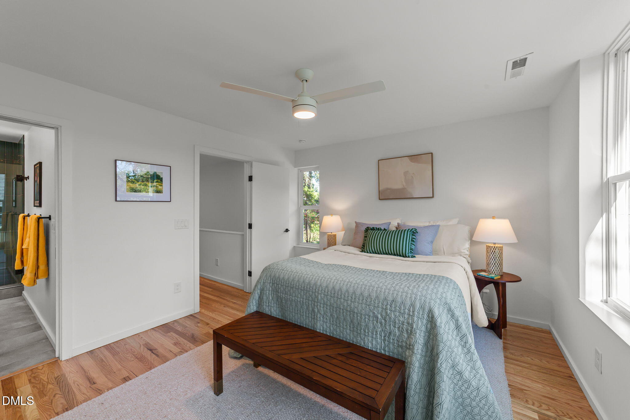 301 Clark Street Durham, NC 27701 - Photo 22 of 30 a bedroom with a bed and wooden floor
