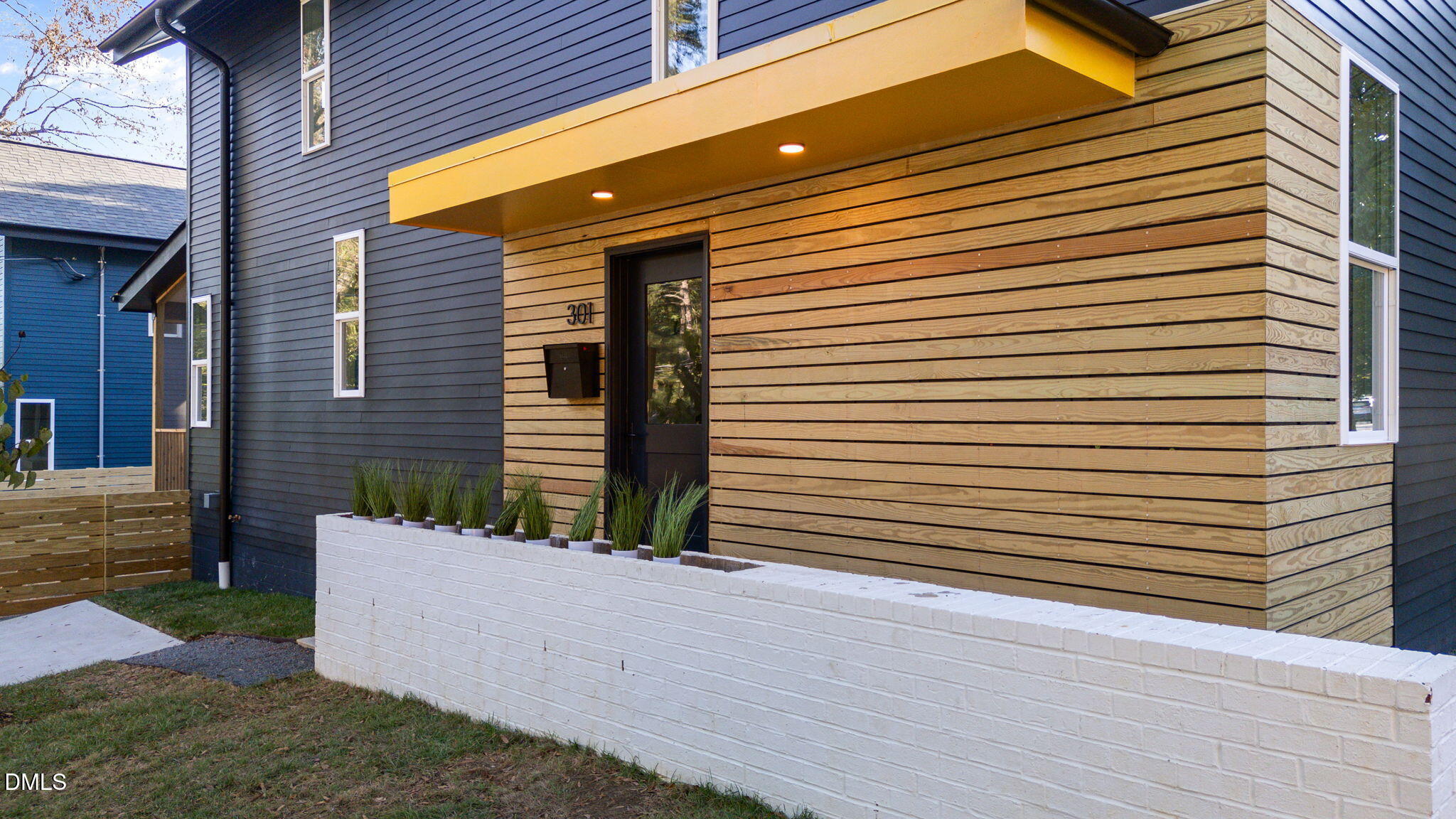 301 Clark Street Durham, NC 27701 - Photo 25 of 30 a front view of a house with a yard