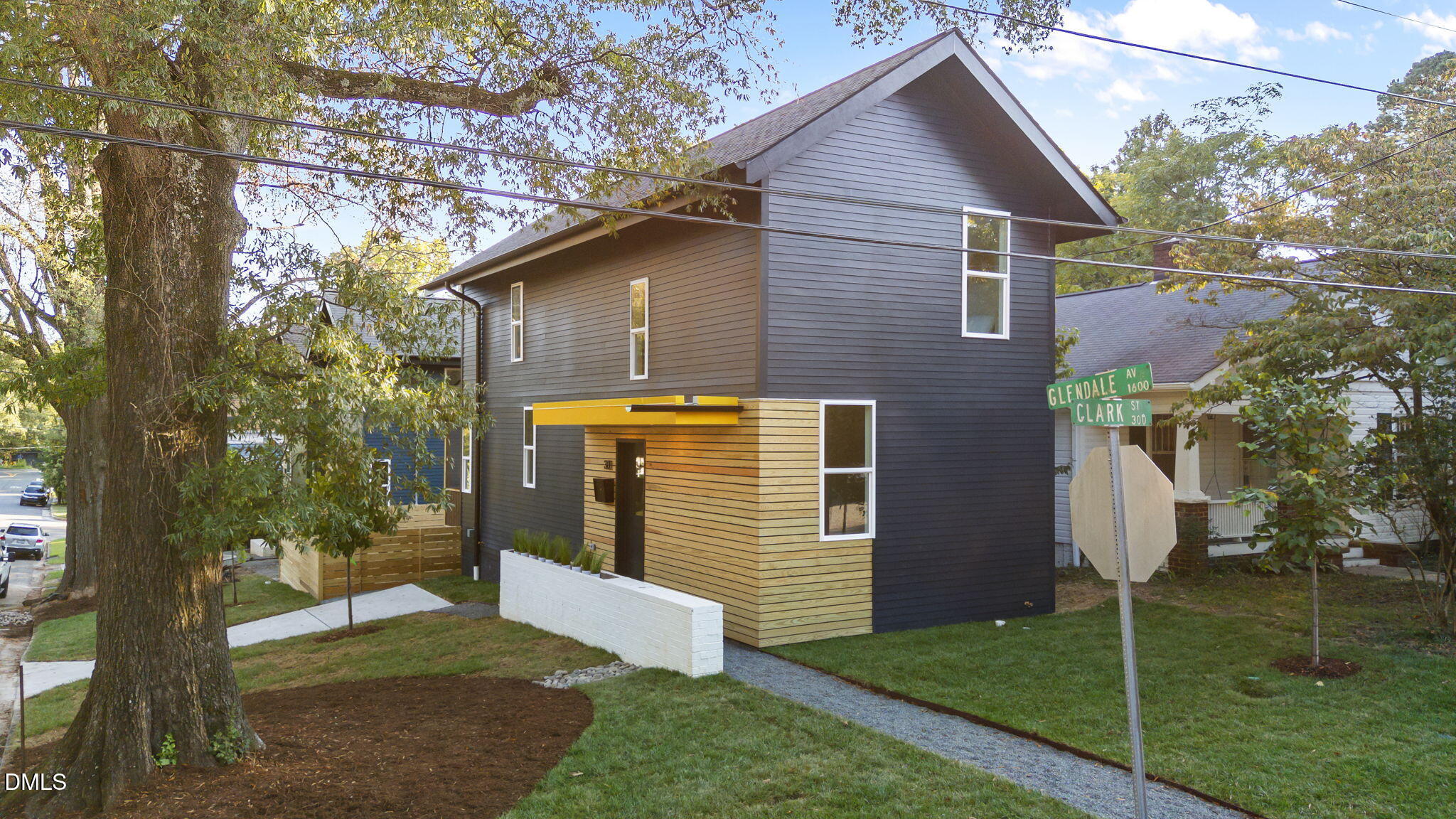 301 Clark Street Durham, NC 27701 - Photo 3 of 30 a front view of a house with a yard