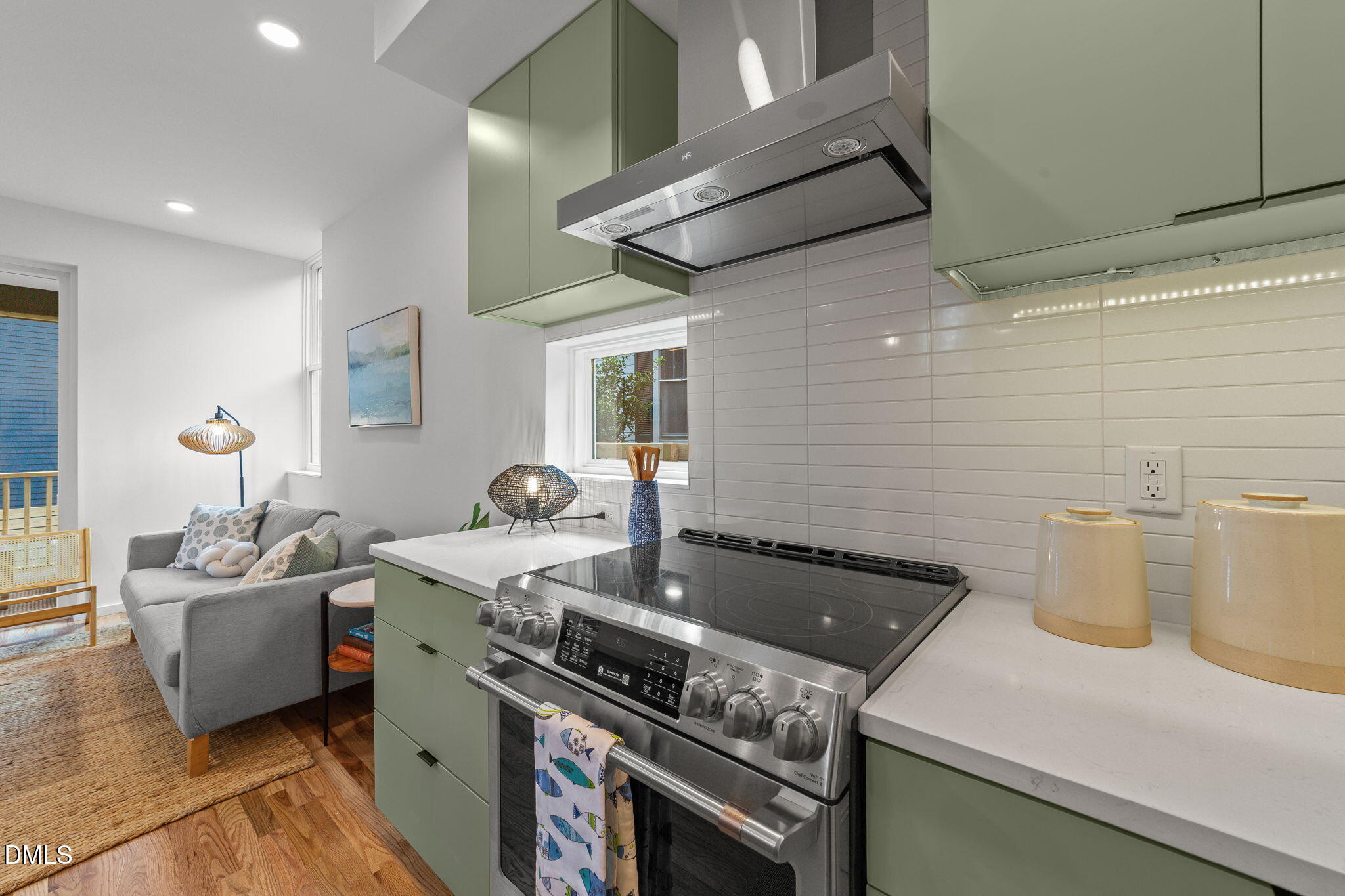 301 Clark Street Durham, NC 27701 - Photo 7 of 30 a kitchen that has a sink and a stove
