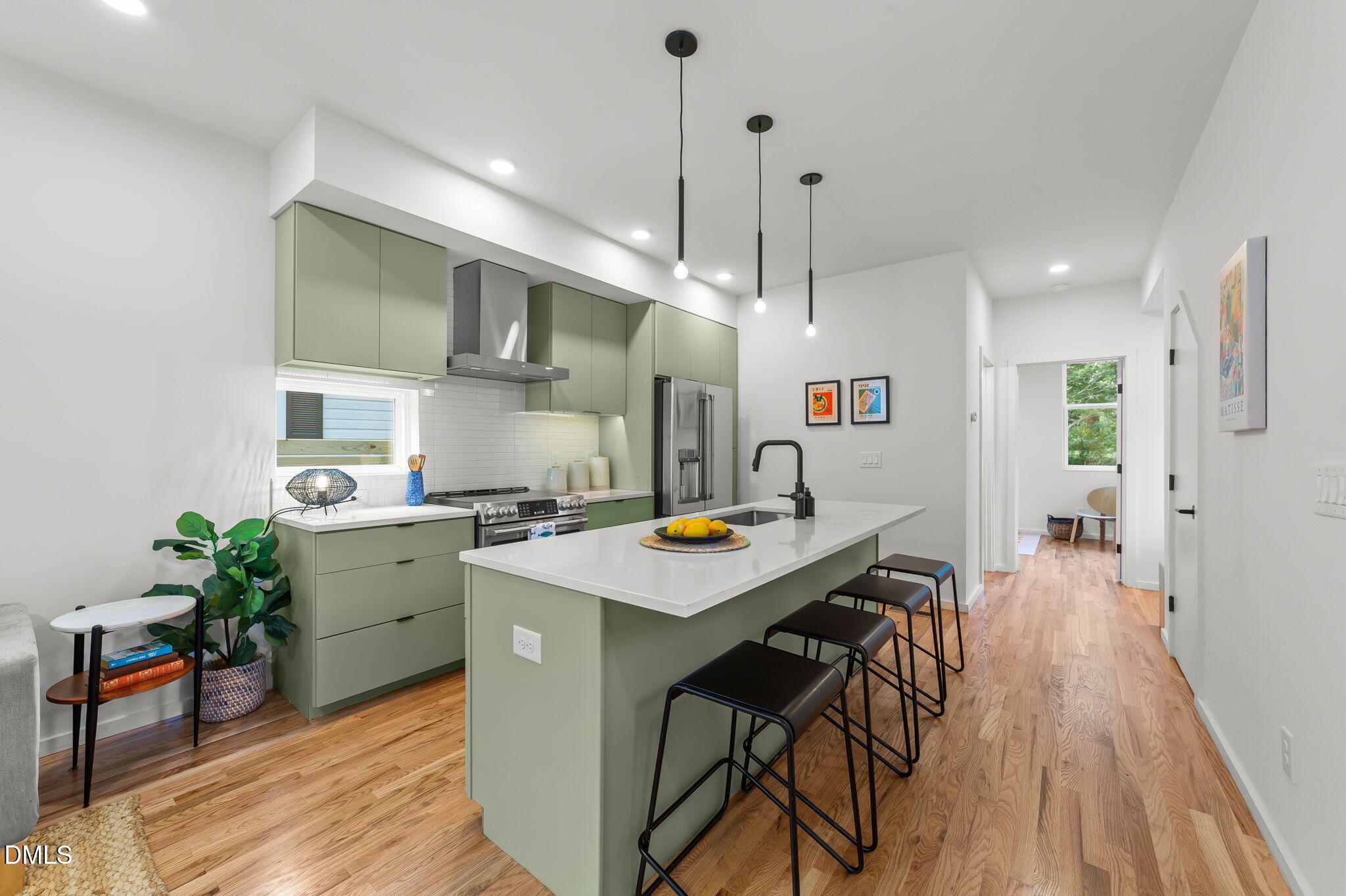 301 Clark Street Durham, NC 27701 - Photo 8 of 30 a kitchen with a table and chairs in it