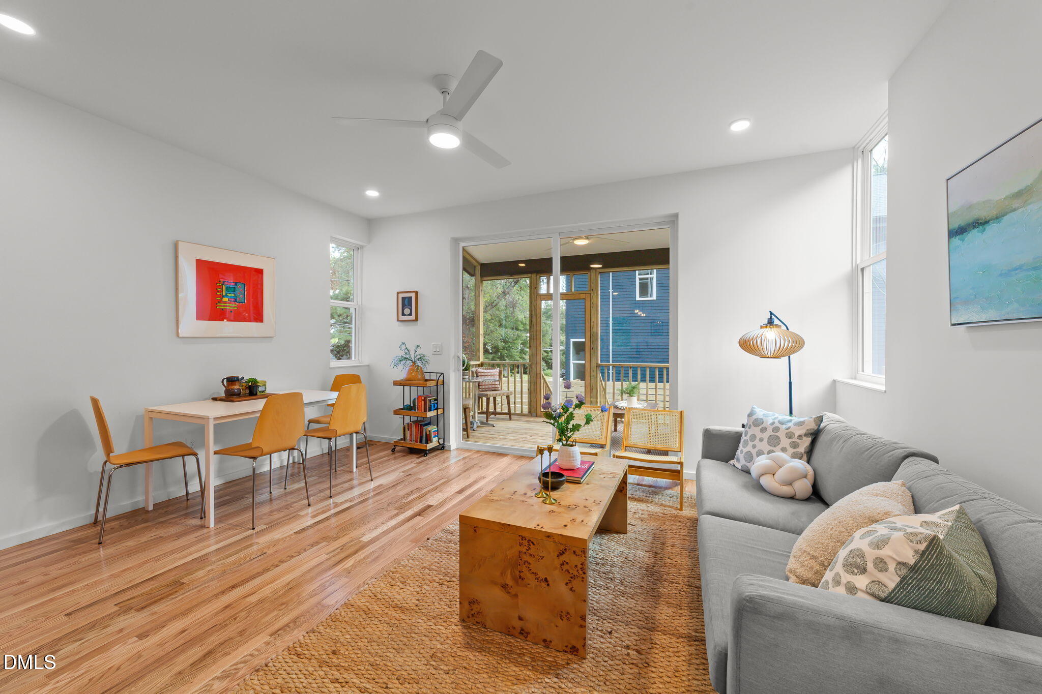 301 Clark Street Durham, NC 27701 - Photo 9 of 30 a living room with furniture and a lamp