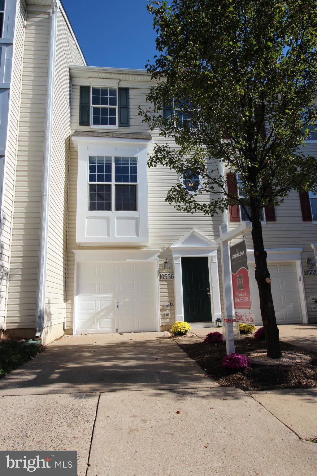 10556 Falkirk Way Manassas, VA 20109 - Photo 1 of 23 a front view of a house with garden