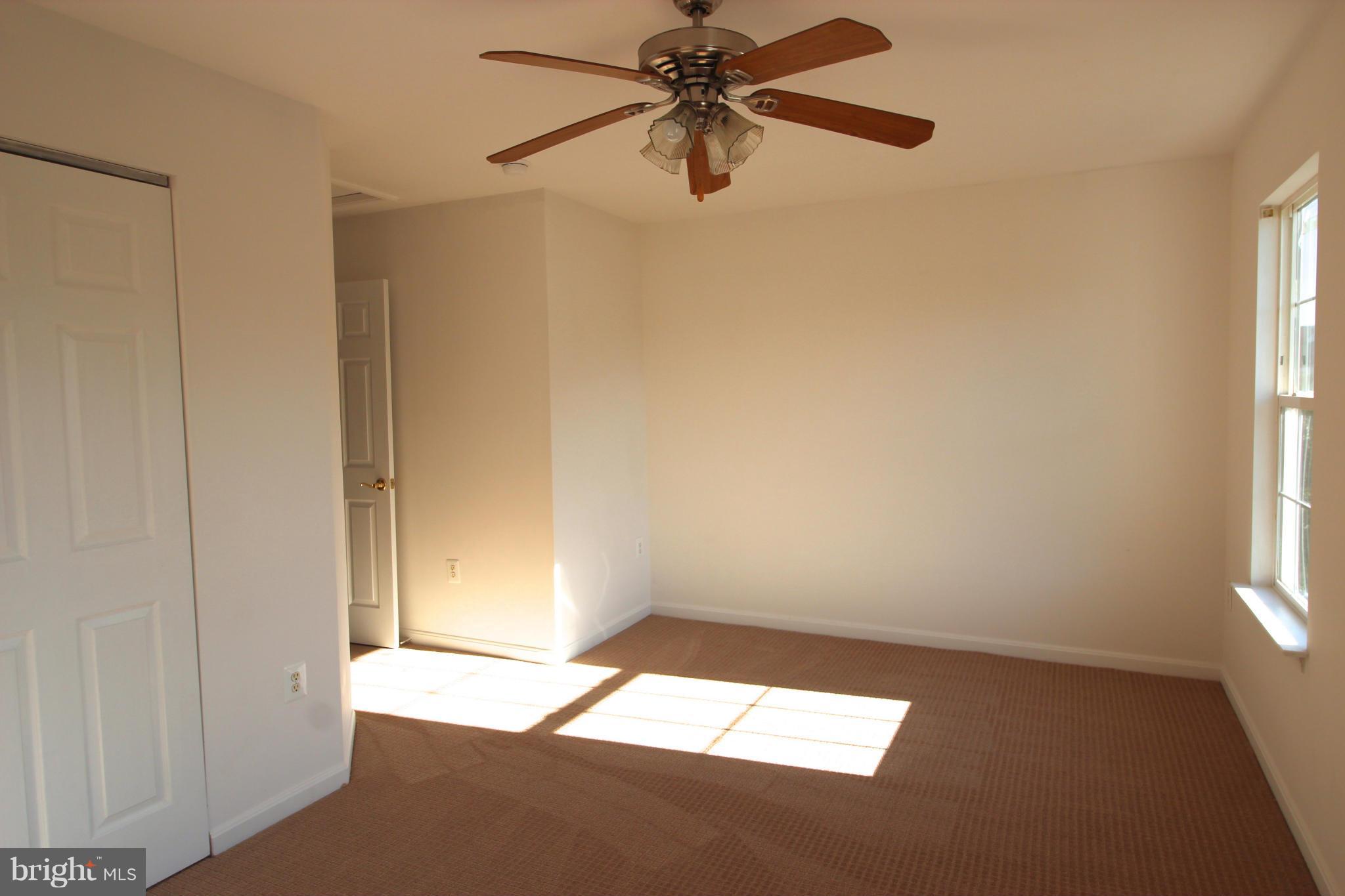 10556 Falkirk Way Manassas, VA 20109 - Photo 13 of 23 a view of an empty room and window