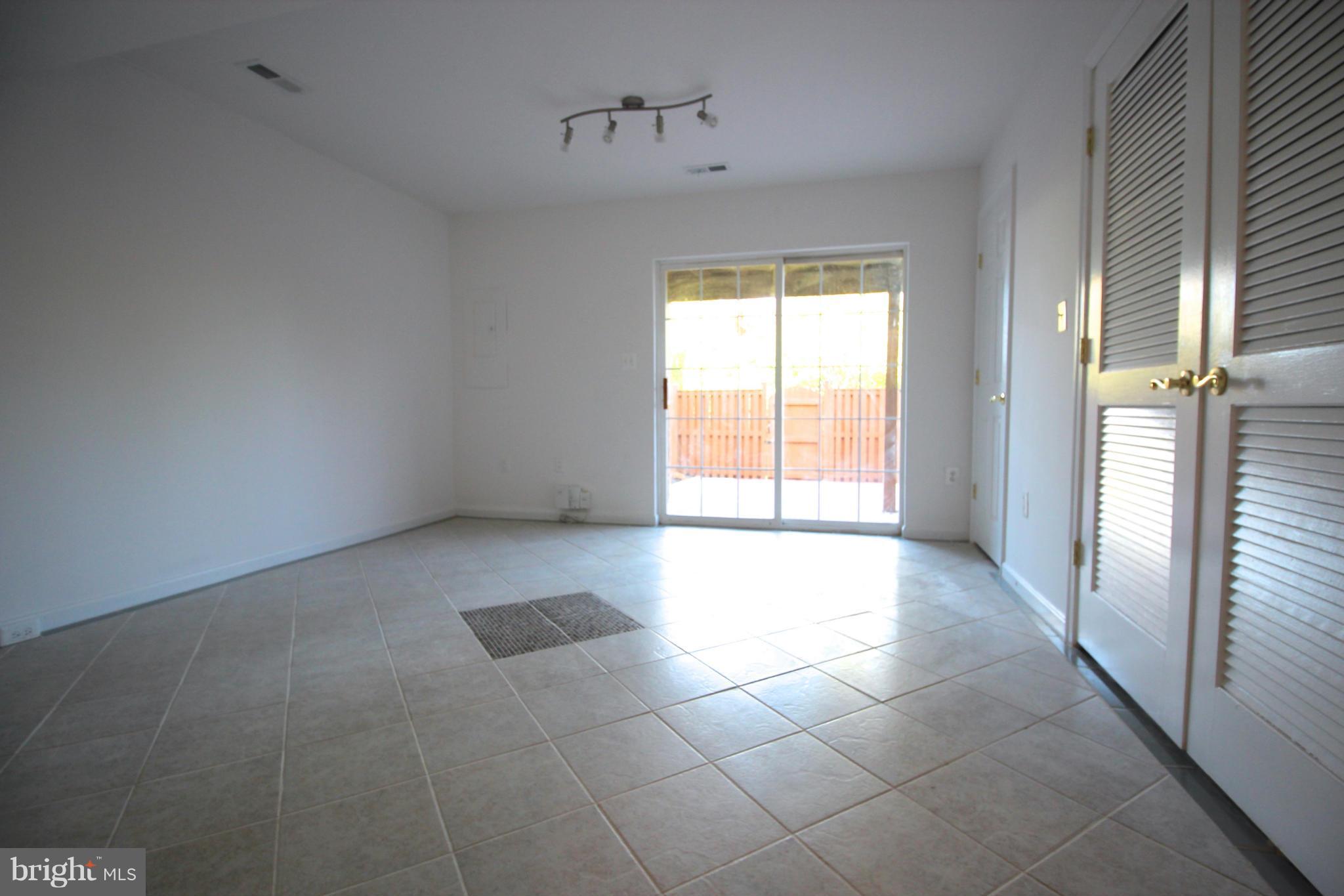 10556 Falkirk Way Manassas, VA 20109 - Photo 19 of 23 a view of an empty room and a window