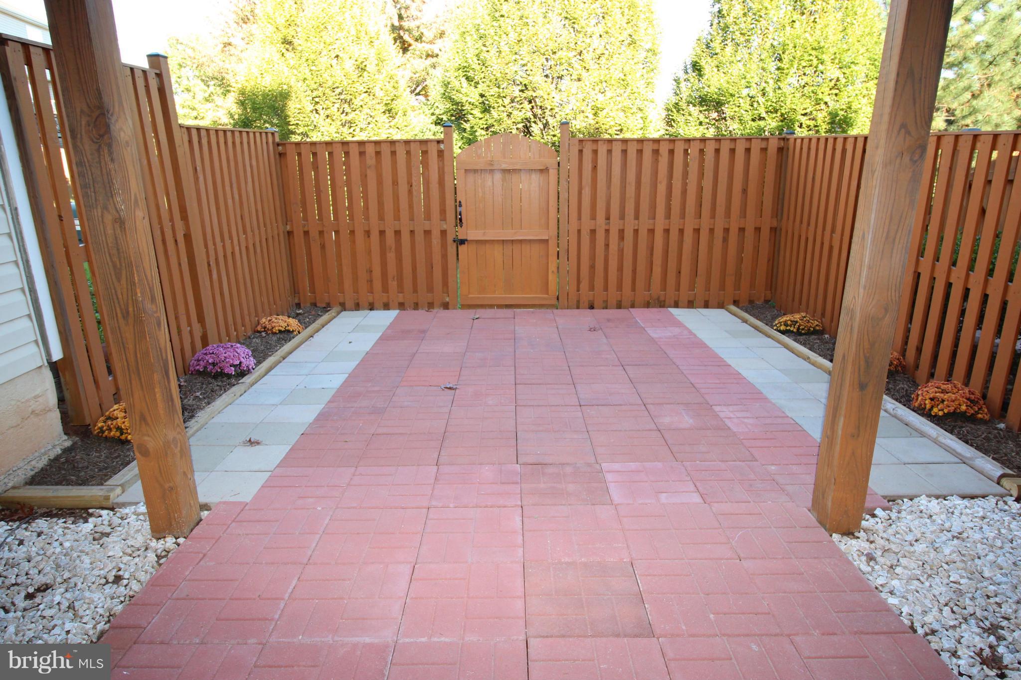 10556 Falkirk Way Manassas, VA 20109 - Photo 20 of 23 a view of a backyard