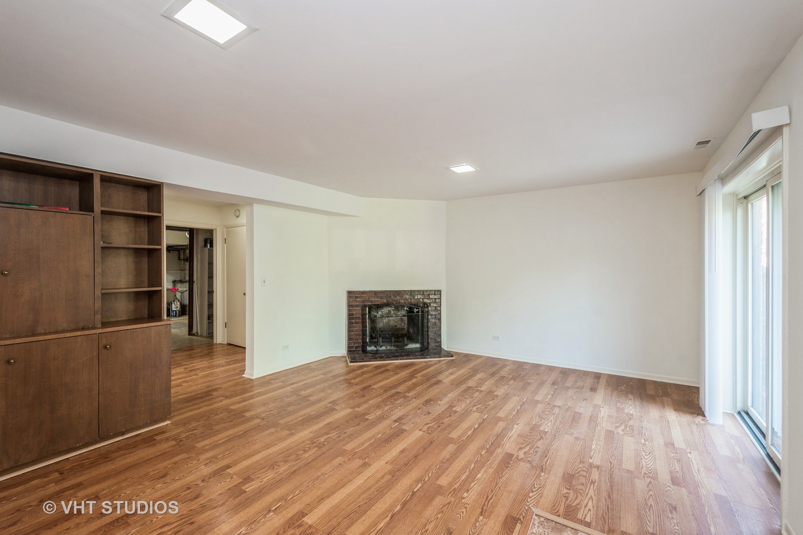 900 South Laflin Street Chicago, IL 60607 - Photo 16 of 20 an empty room with wooden floor closet and windows