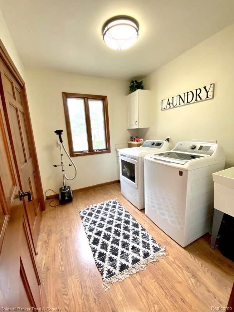 4233 Augusta Court Howell, MI 48843 - Photo 19 of 49 Large Laundry Room with Loads of Natural Light!