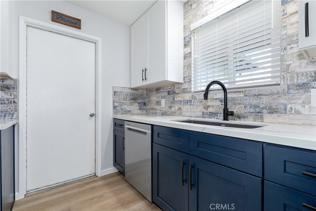 8425 Azucena Avenue Atascadero, CA 93422 - Photo 17 of 47 a bathroom with a sink and a mirror