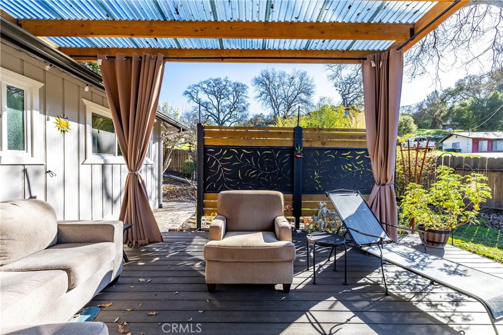 8425 Azucena Avenue Atascadero, CA 93422 - Photo 32 of 47 a living room with furniture and a large window