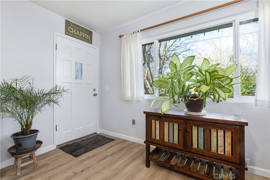 8425 Azucena Avenue Atascadero, CA 93422 - Photo 7 of 47 a living room with furniture and a potted plant