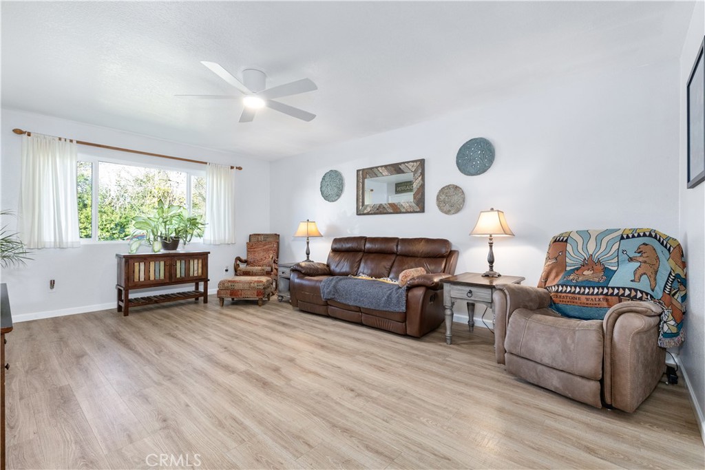 8425 Azucena Avenue Atascadero, CA 93422 - Photo 10 of 47 a living room with furniture and a large window