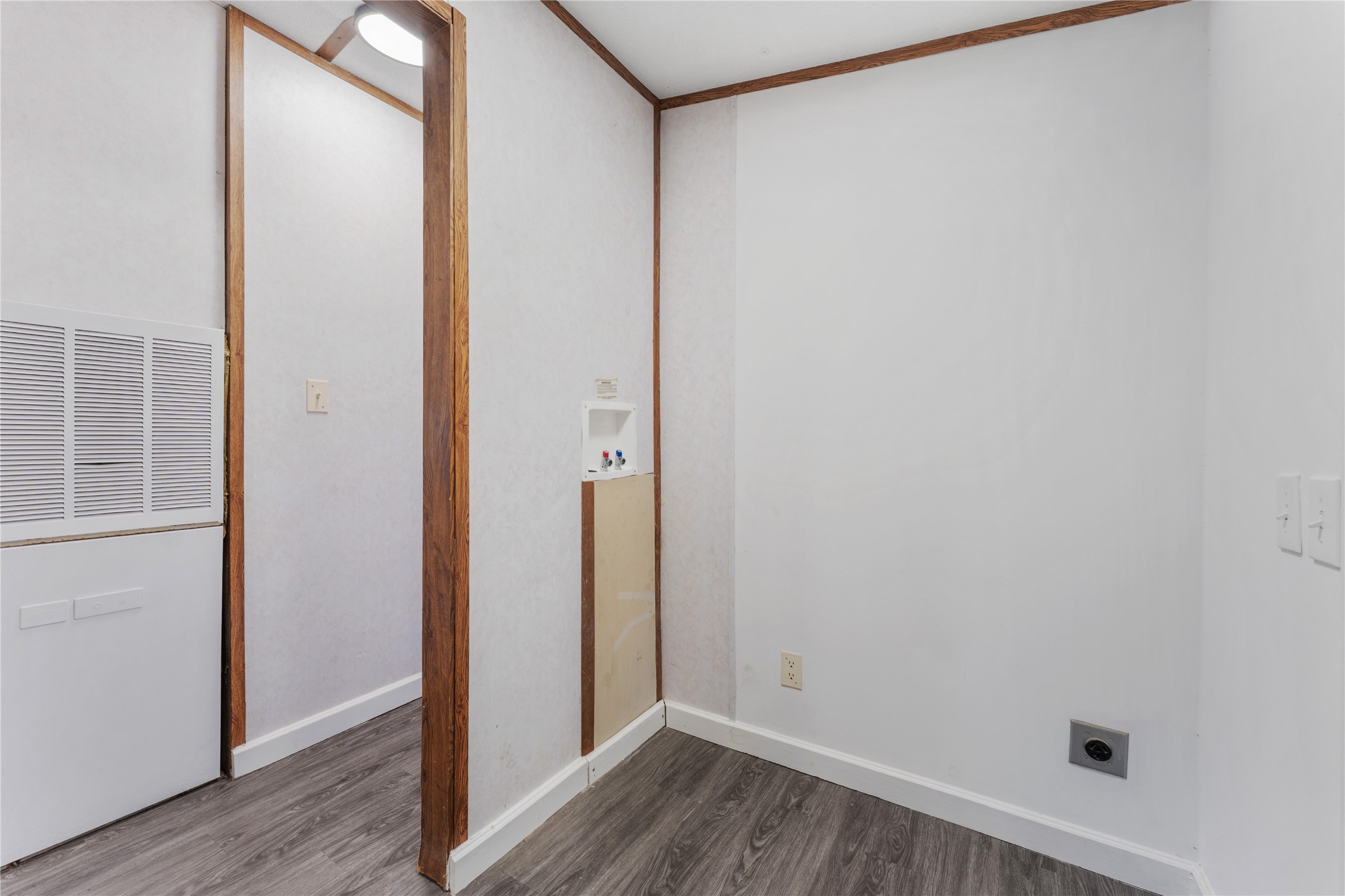 21504 Mexican John Road New Caney, TX 77357 - Photo 3 of 15 Solid surface flooring throughout