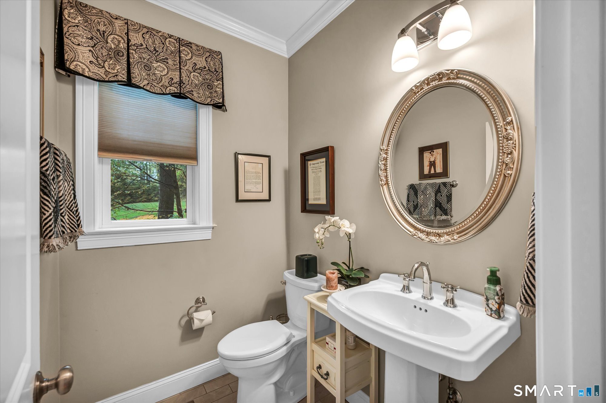 16 Sweetheart Mountain Road Canton, CT 06019 - Photo 8 of 40 a bathroom with a toilet a sink and a mirror