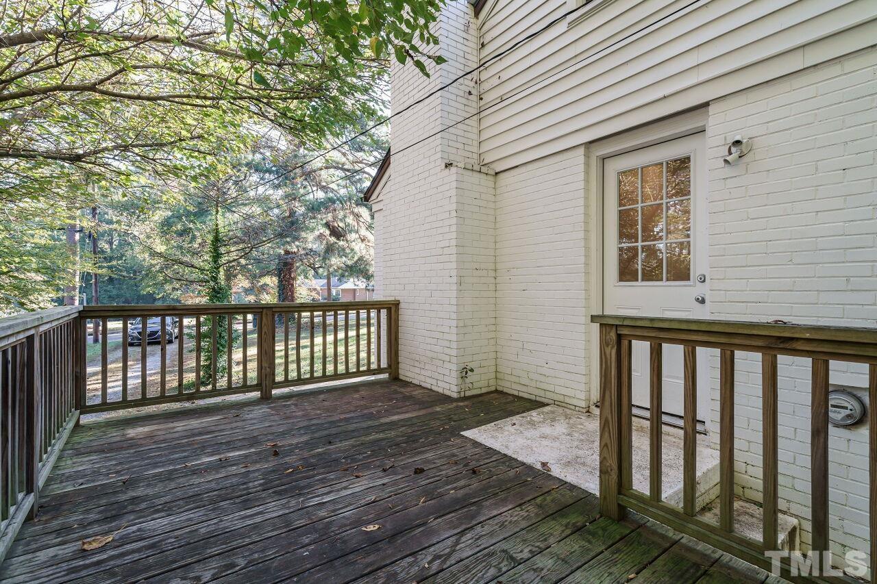 141 Lord Ashley Road Raleigh, NC 27610 - Photo 23 of 28 a view of a wooden deck