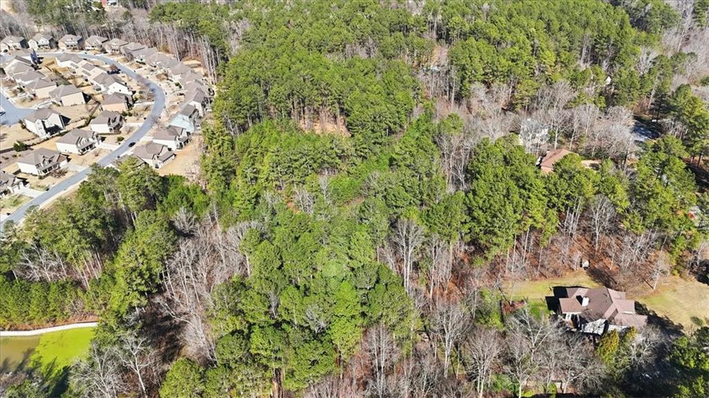 215 Pickett's Way Acworth, GA 30101 - Photo 21 of 23 a view of a garden with a tree