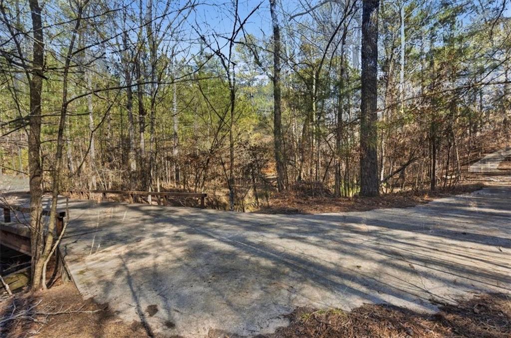 215 Pickett's Way Acworth, GA 30101 - Photo 5 of 23 a view of a yard with trees