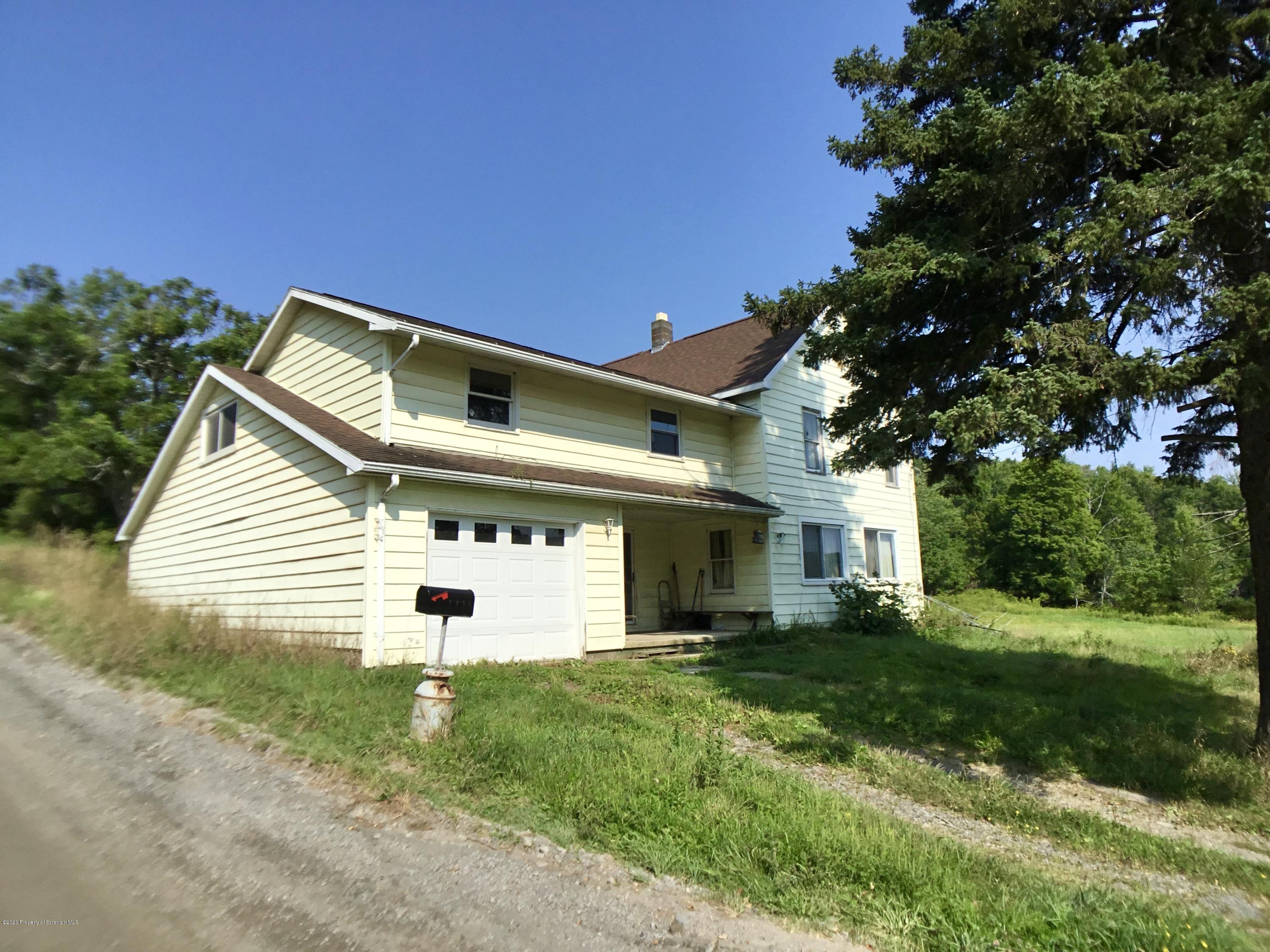 1059 Mountain Valley Road Hallstead, PA 18822 - Photo 2 of 30 a view of a house with a yard