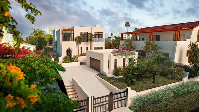 a front view of a house with lots of trees around