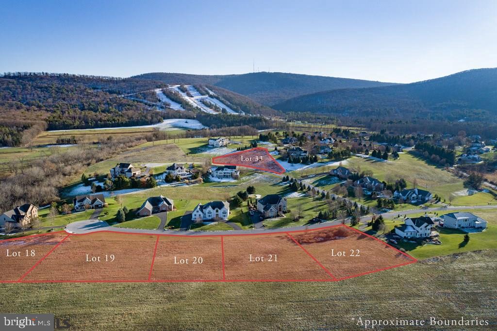 133 Roundhill Road Boalsburg, PA 16827 - Photo 4 of 11 a view of a city with mountains in the background