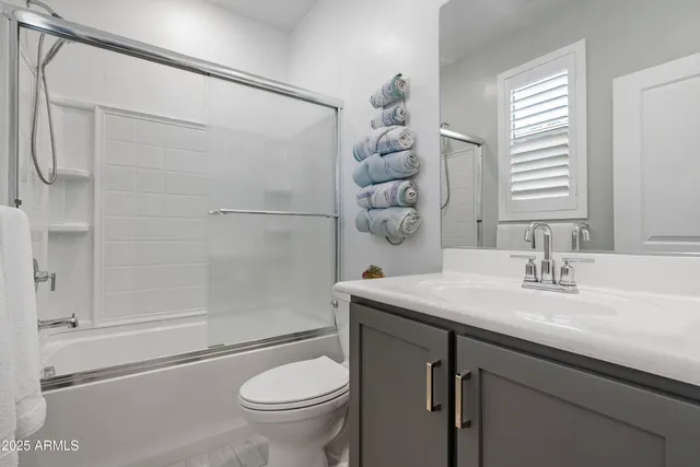 a hallway with a piano and wooden floor