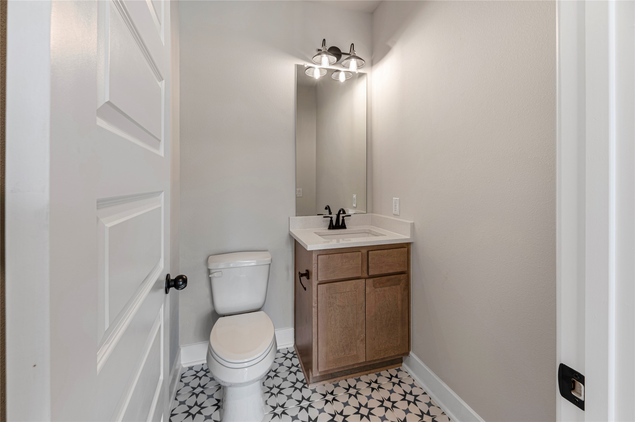 1508 Rodeo Ridge Drive Georgetown, TX 78628 - Photo 17 of 37 Half bathroom featuring vanity and toilet