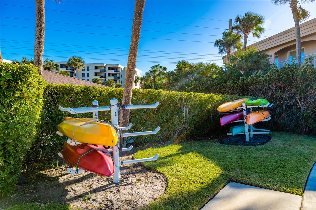 4601 Florida A1A, Unit 405 Vero Beach, FL 32963 - Photo 28 of 36 a view of a swimming pool with a patio