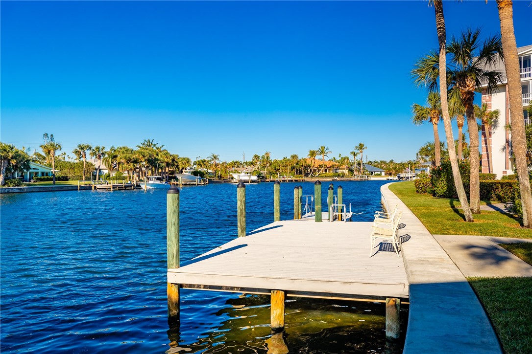 4601 Florida A1A, Unit 405 Vero Beach, FL 32963 - Photo 33 of 36 a view of a terrace with a garden