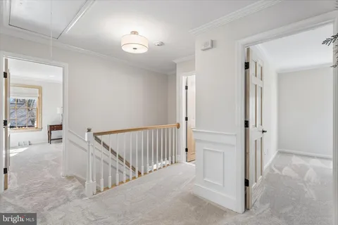 a view of a patio with a table and chairs