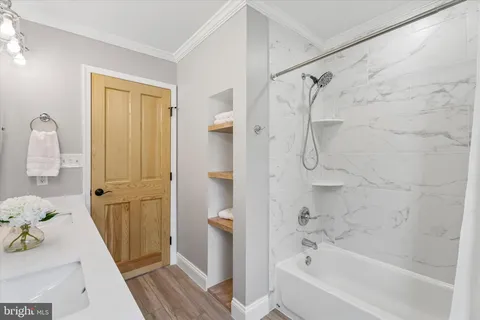 a view of a terrace with furniture and garden