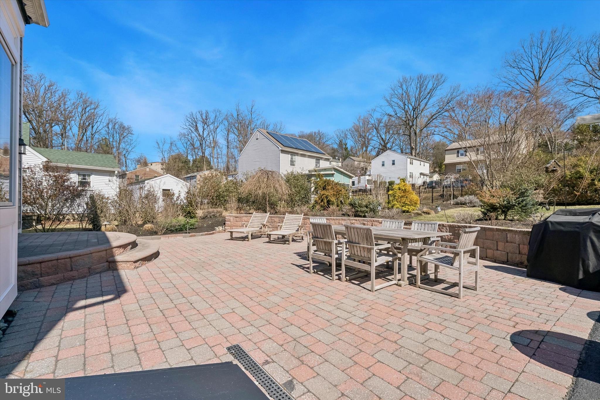 649 Glendale Road Havertown, PA 19083 - Photo 42 of 67 a view of a patio with a table and chairs