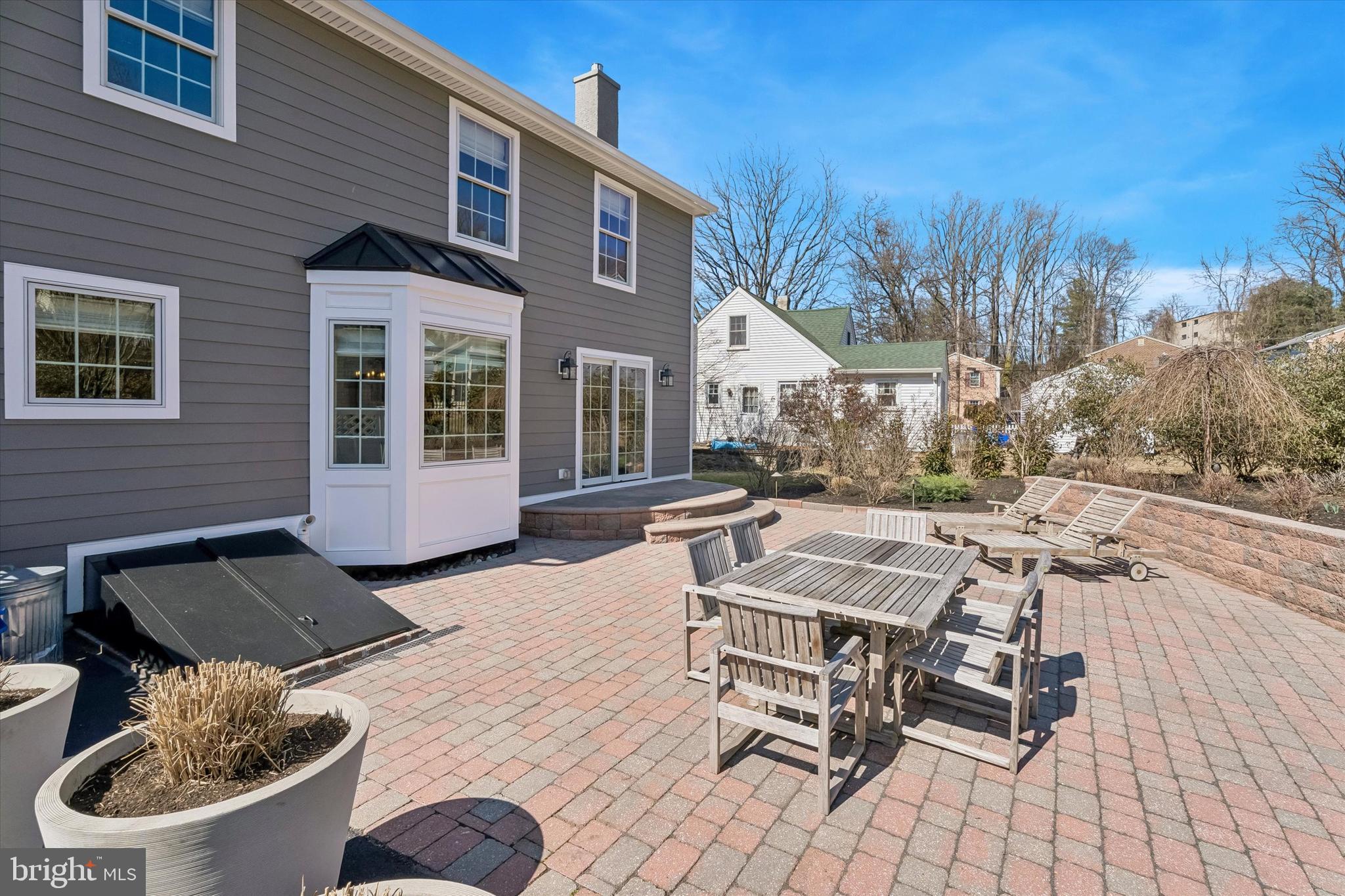 649 Glendale Road Havertown, PA 19083 - Photo 43 of 67 a view of a patio with couches table and chairs and potted plants