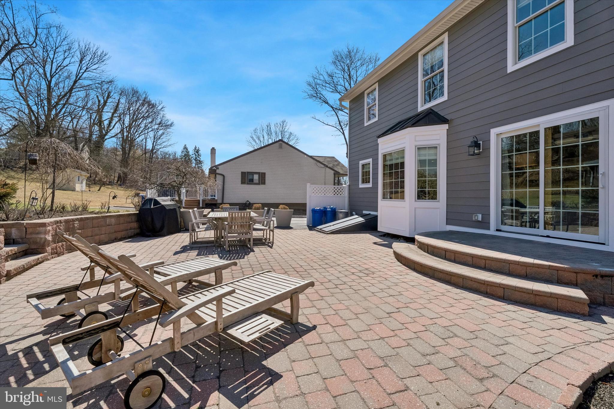 649 Glendale Road Havertown, PA 19083 - Photo 45 of 67 a view of a house with backyard porch and sitting area