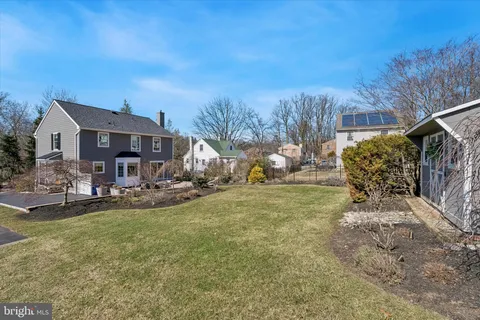 a view of a chairs and table in the patio