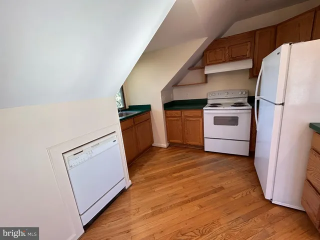 a utility room with washer and dryer